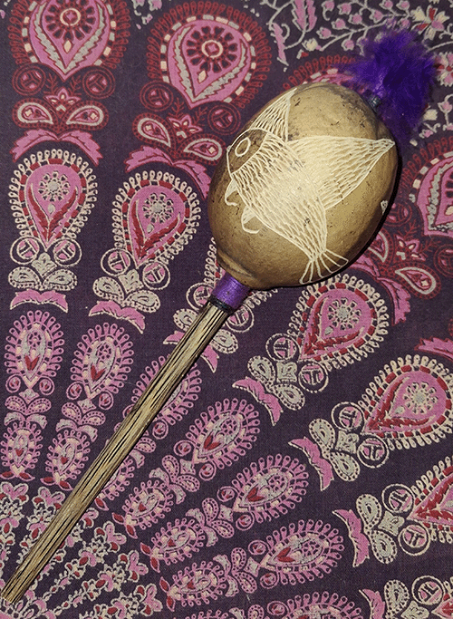 Shamanic rattles on a patterned cloth